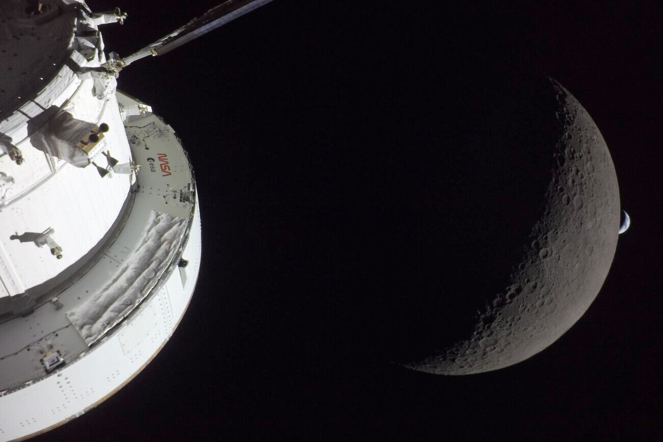 Artemis Orion spacecraft with Moon and Earth
